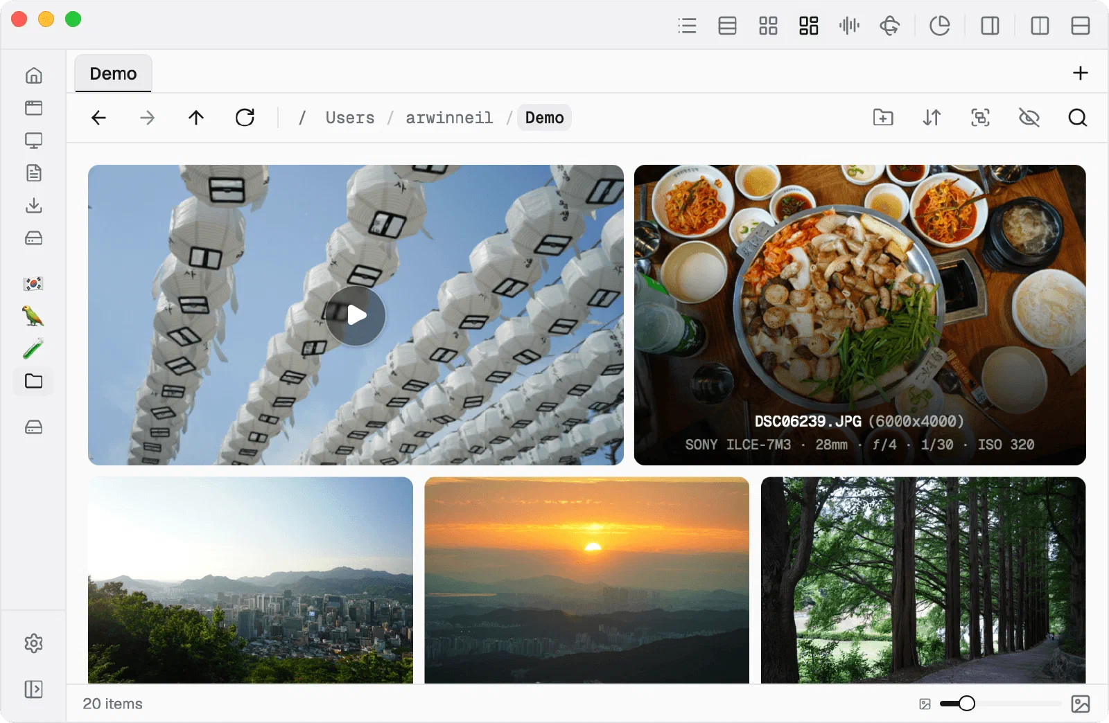 Flies showing a photo folder as a grid gallery, with camera, lens and exposure on each thumbnail
